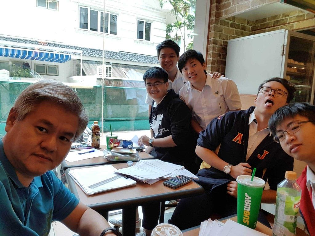 Mr Edmund Ling with his students Mr Edmund Ling with his students