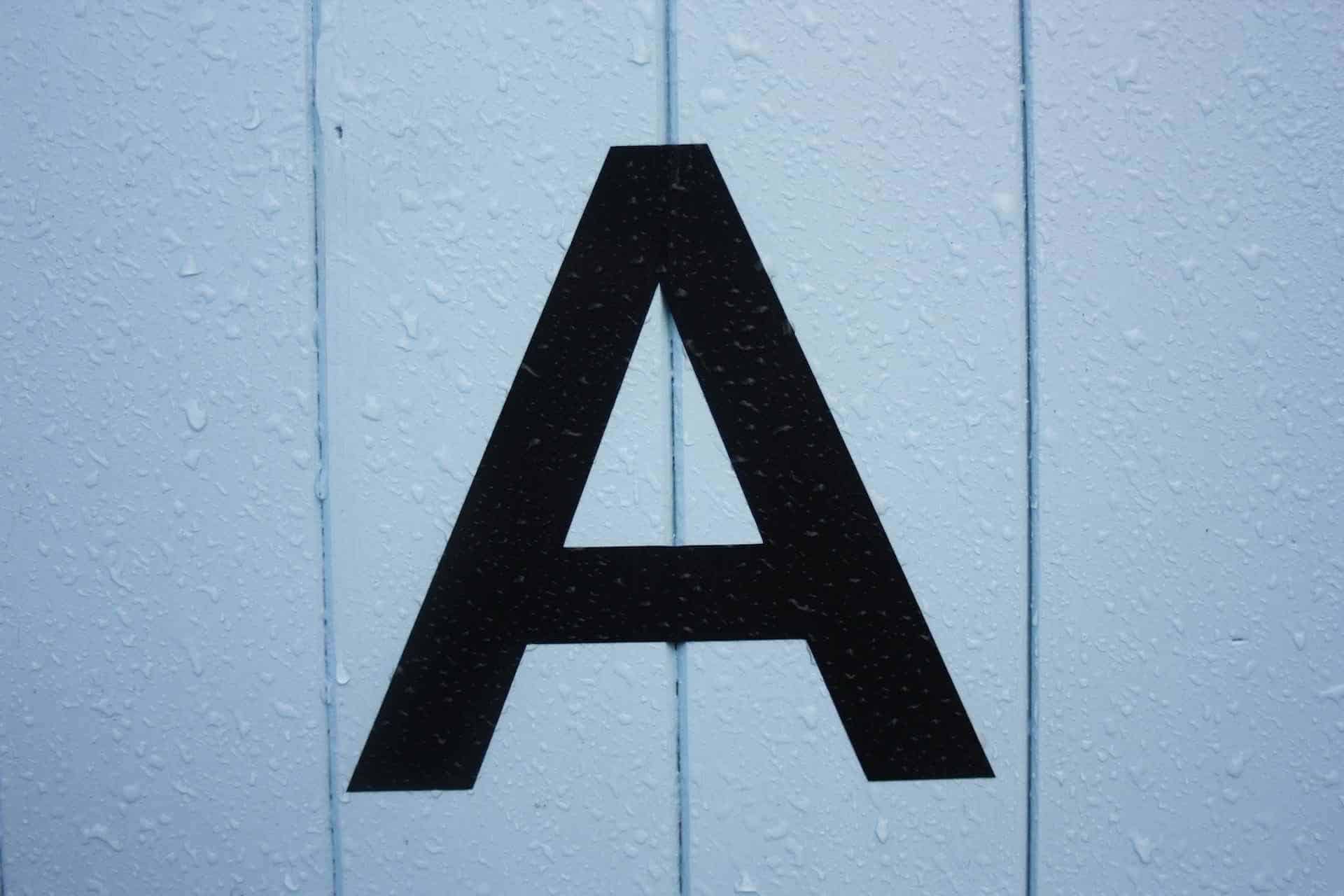 A wall with a letter A painted on it